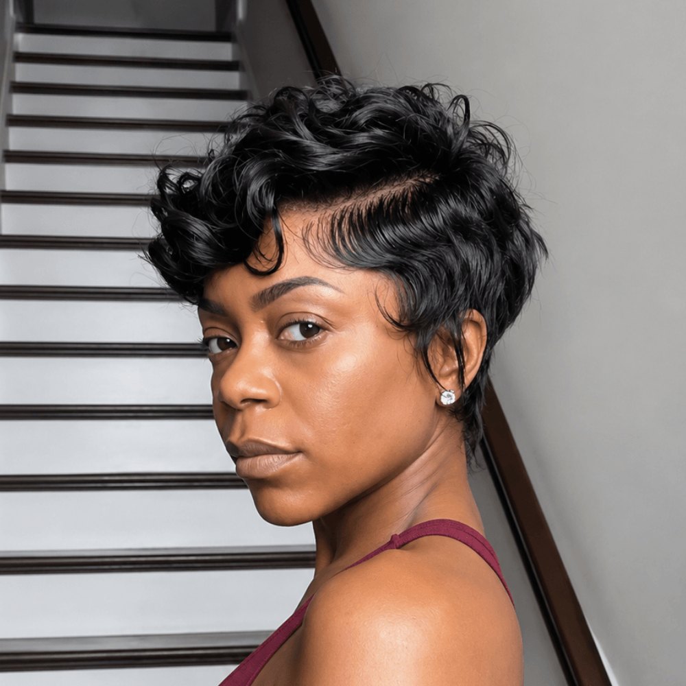 Black woman with a glossy side-parted curly pixie and sculpted edges