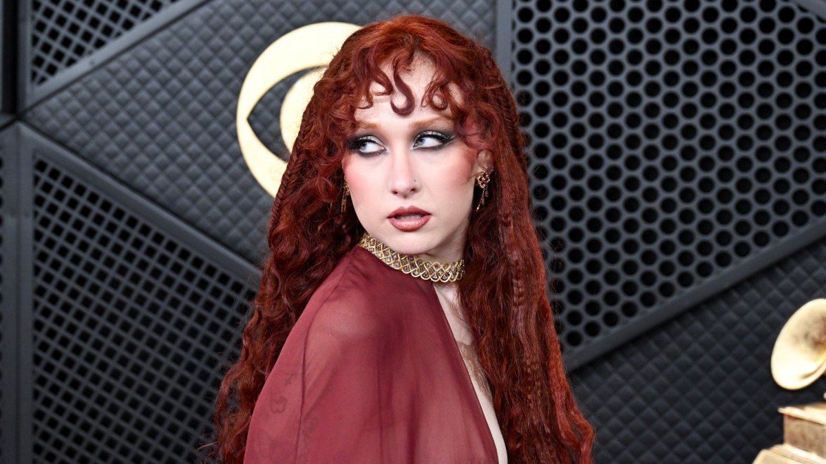 Chappell Roan with long red curly hair and wispy bangs at the Grammys