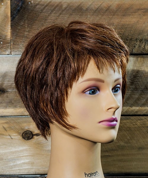 Short bixie haircut with soft layers on a woman over 50