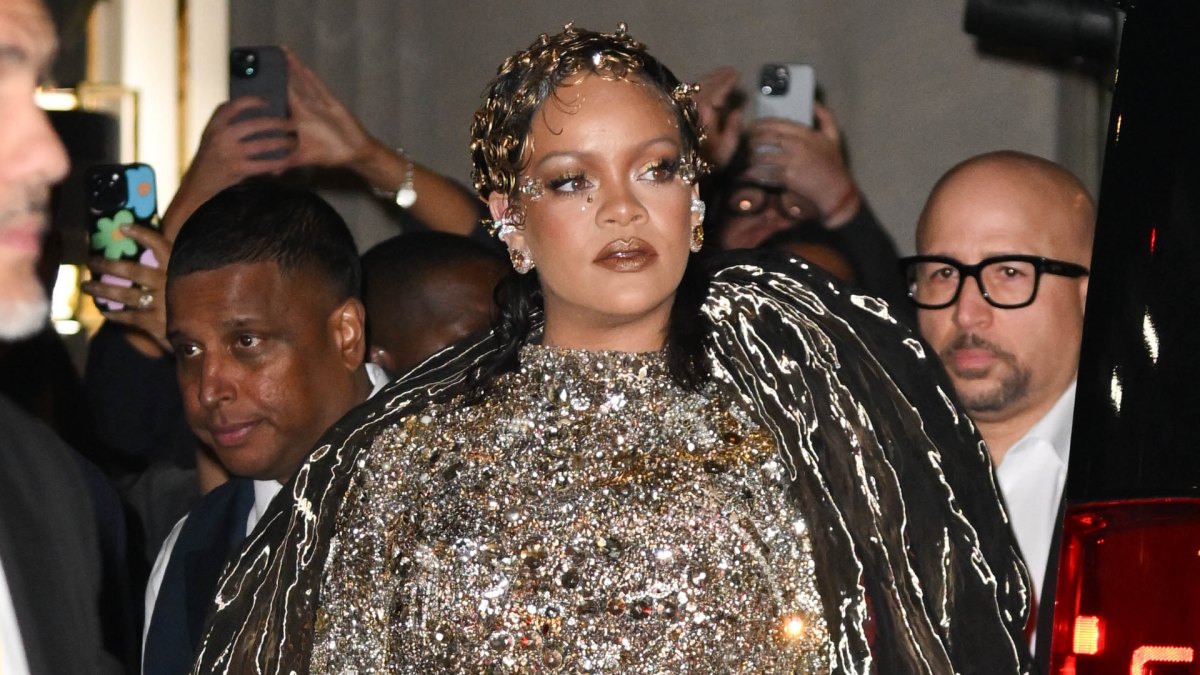 Rihanna with a golden floral-adorned finger-wave updo at the Met Gala