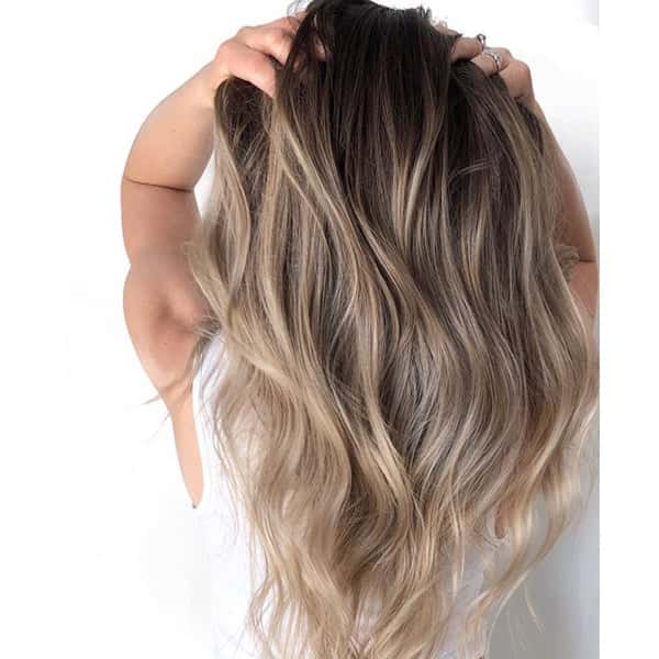 Long wavy hair with creamy honey butter balayage blend